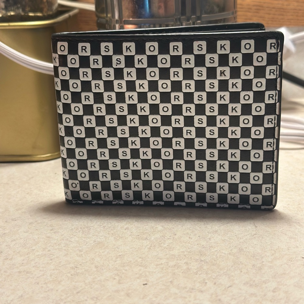 Michael Kors Cooper bilfold bifold wallet.  Black and white. Used, mild wear